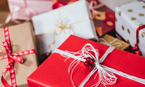 Buy gifts together - Tips For Buying Christmas Gifts On a Budget